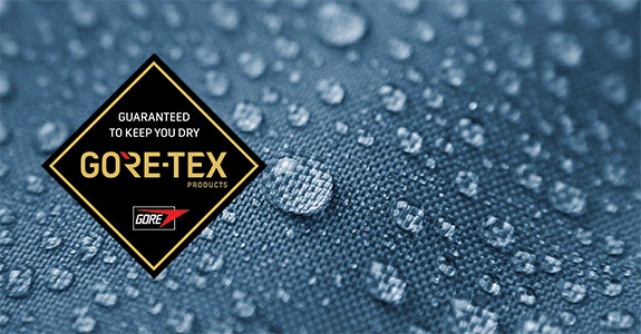 blue fabric with water droplets on and Gore-Tex logo